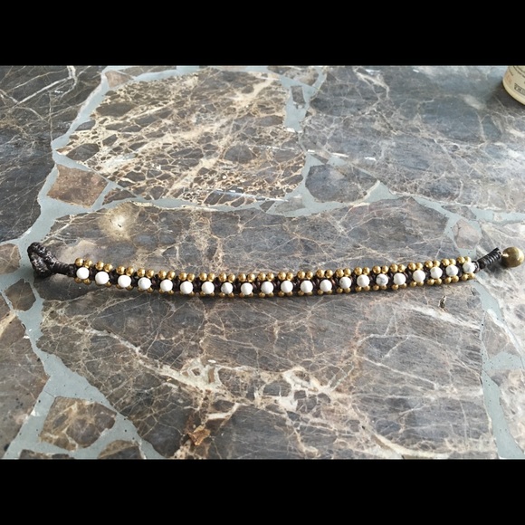 Hand woven beaded white bracelet with bell closure - Picture 3 of 3